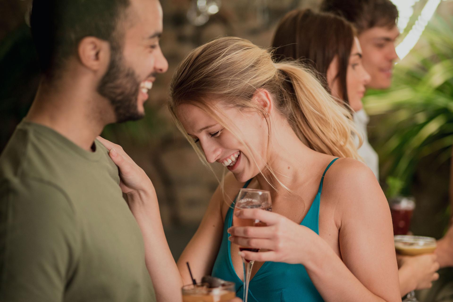 Enjoying Drinks In A Bar